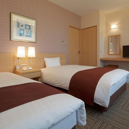 Kanazawa Tokyu Hotel Exterior foto A typical room at the hotel