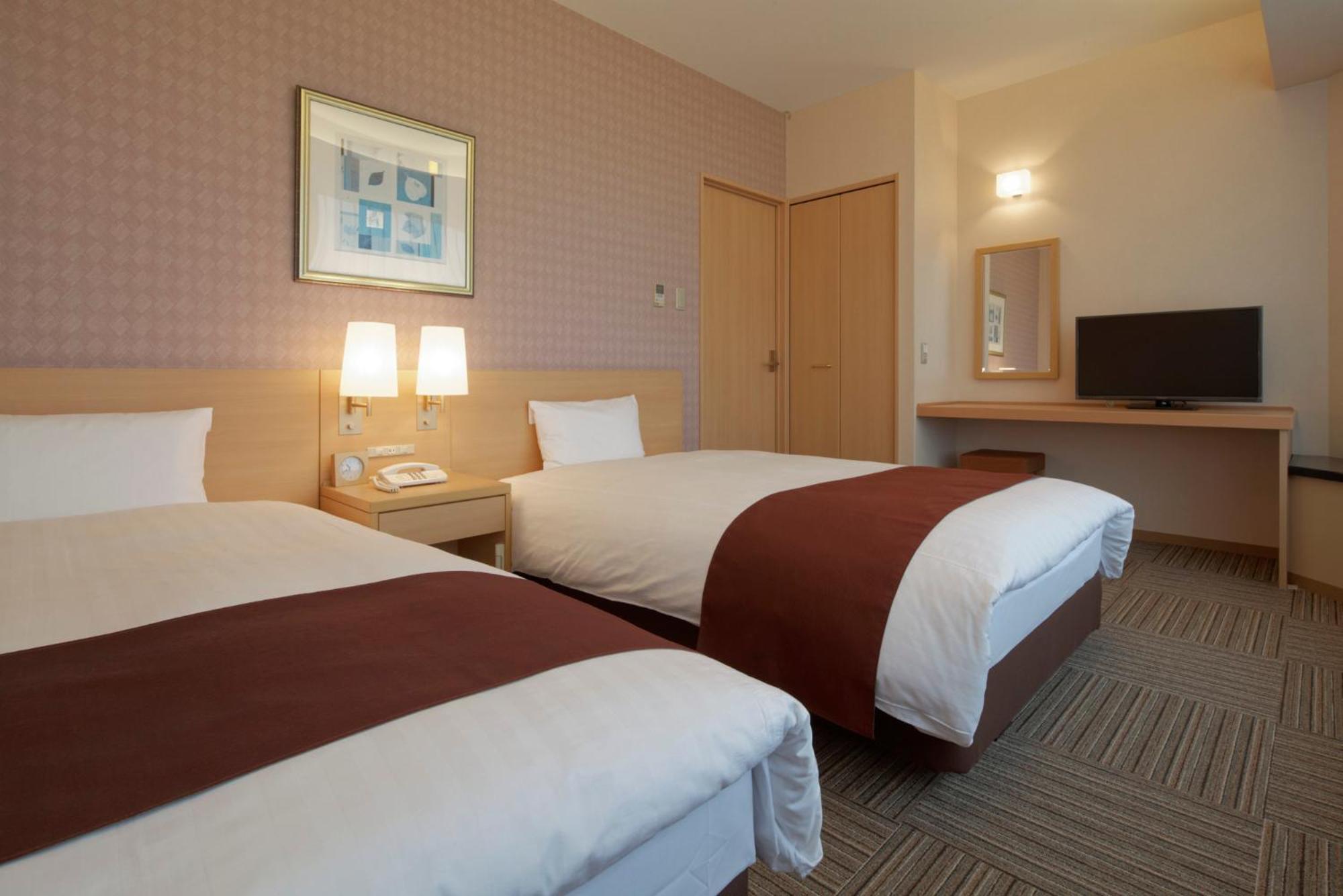 Kanazawa Tokyu Hotel Exterior foto A typical room at the hotel